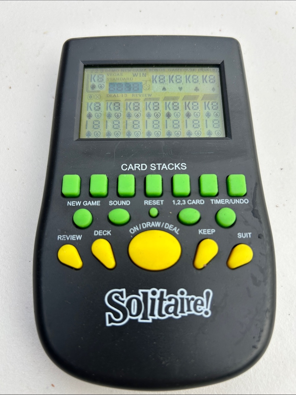 Handheld Electronic Solitaire Game - Black with Green & Yellow Buttons